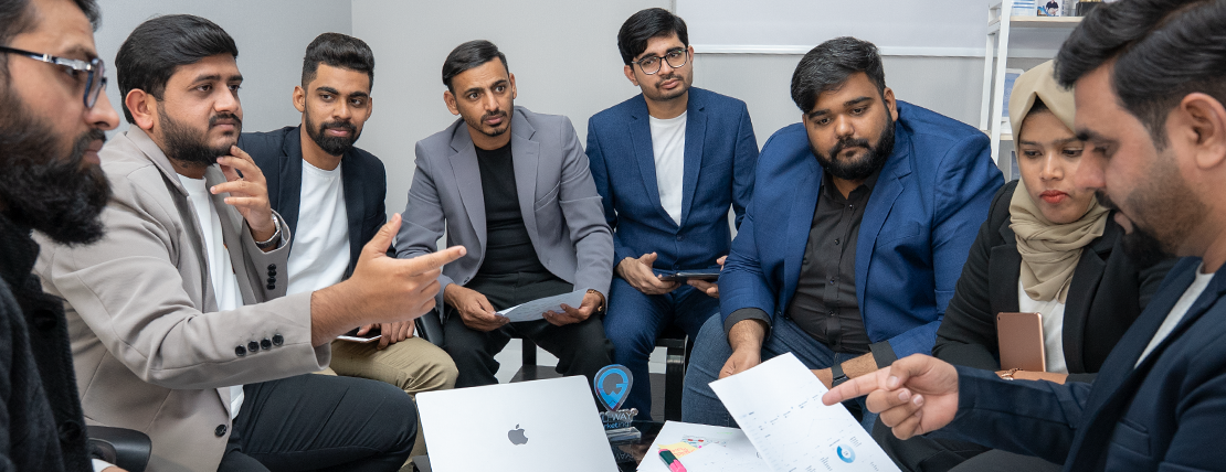 Gulf Way Oil Trading Media & Digital Marketing team intently brainstorming creative campaigns and brand strategy in a collaborative meeting