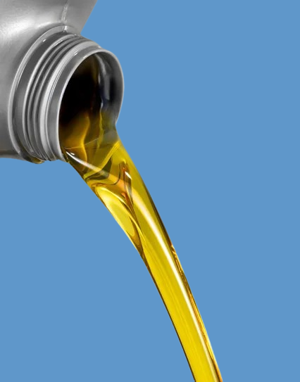 Oil pouring from Gulf Way bottle in a creative conceptual design