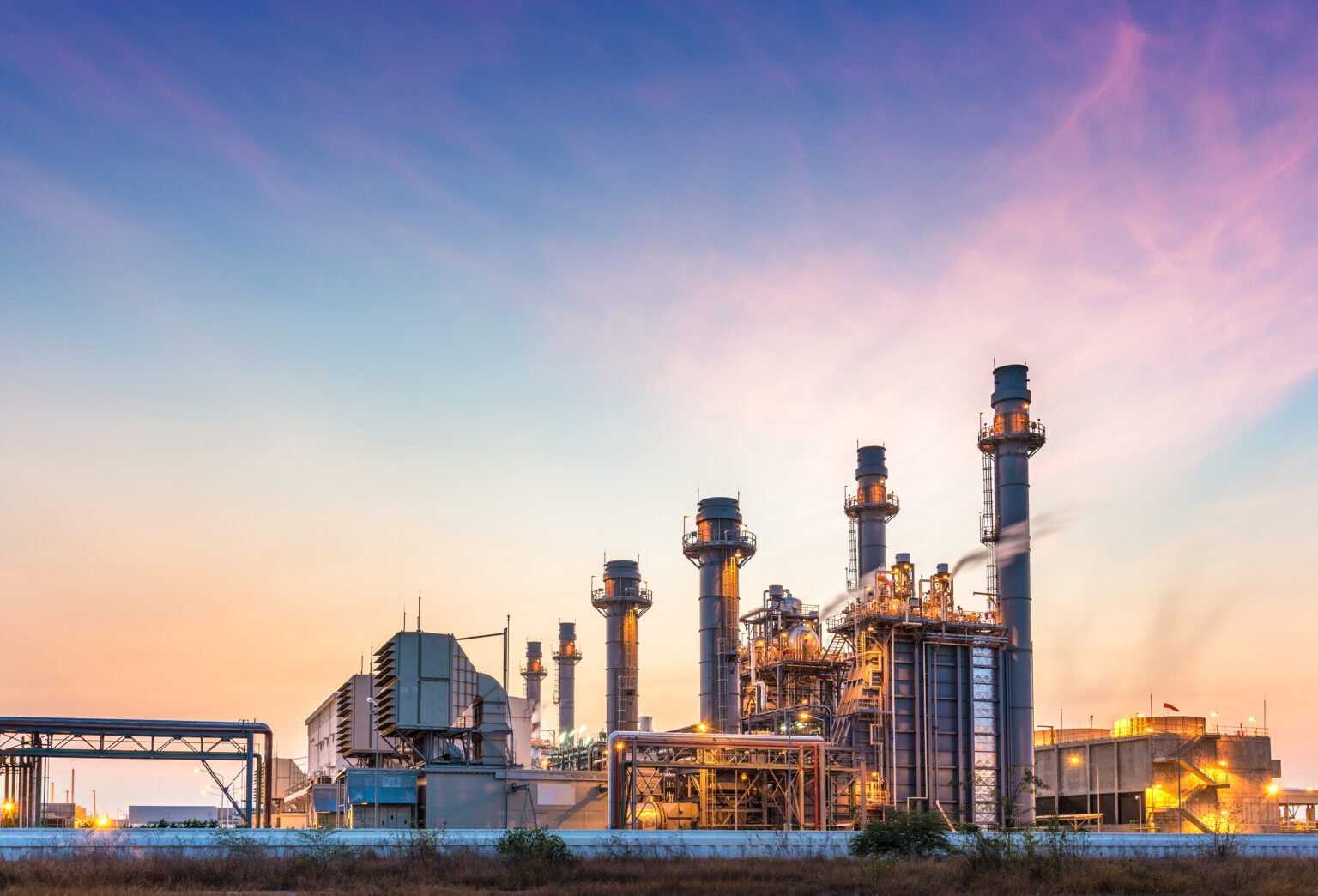 Power plant with industrial background representing Gulf Way's mission
